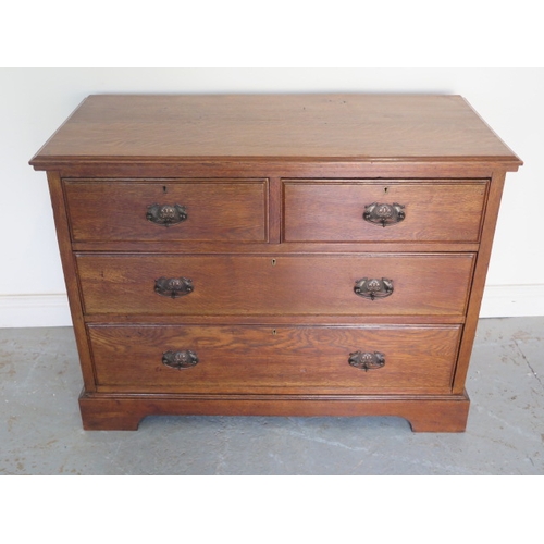 647 - A circa 1900's oak arts and crafts chest of two over two drawers on a plinth base - Height 81cm x 10... 