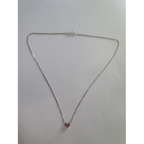 70 - An 18ct white gold pink sapphire heart pendant on an 18ct white gold 38cm chain - in good condition ... 