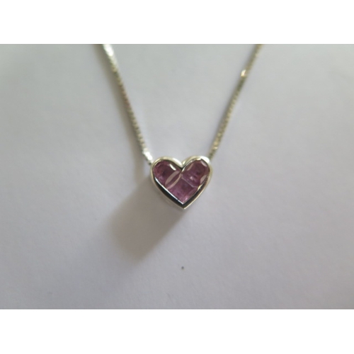 70 - An 18ct white gold pink sapphire heart pendant on an 18ct white gold 38cm chain - in good condition ... 