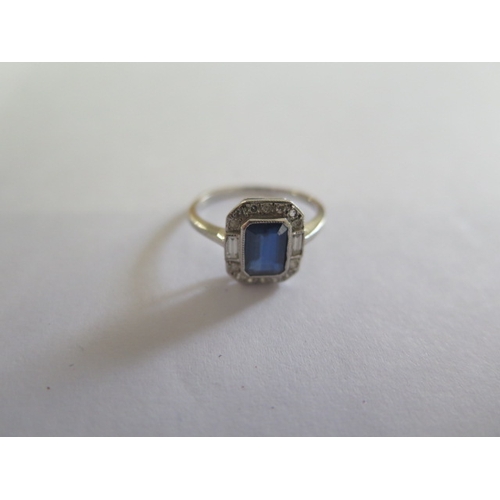 73 - A white metal (possibly platinum) sapphire and diamond ring size J/K - head approx 10mm x 9mm - in g... 