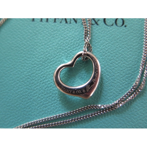 76 - A Tiffany Elsa Peretti 925 silver heart on 46cm chain with box and pouch .Both the Heart and chain a... 