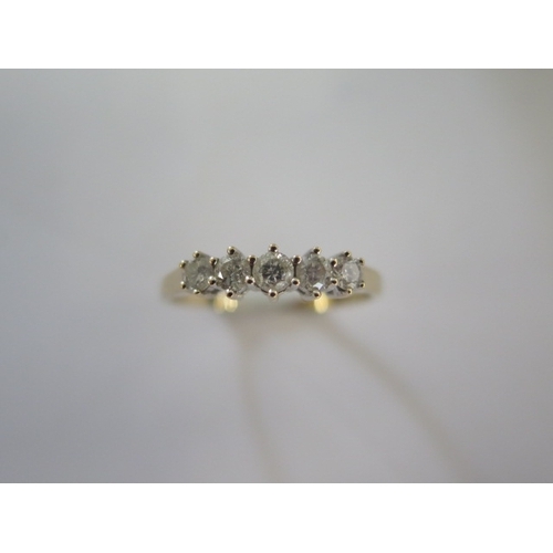 133 - A 9ct yellow gold five stone diamond ring - approx 0.5ct of diamonds, diamond weight marked to the i... 