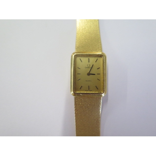 14 - A ladies 18ct yellow gold Omega quartz wristwatch - 18mm case - approx weight 50 grams - in good con... 
