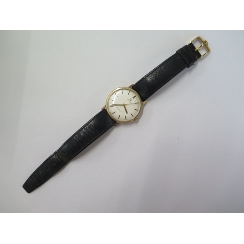 15 - An Omega 9ct yellow gold manual wind presentation wristwatch - 32mm case - running, some scratches -... 