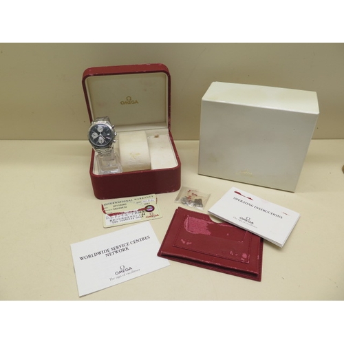23 - A stainless steel 2011 Omega Speedmaster reverse panda automatic chronograph gents bracelet wristwat... 
