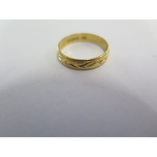 79 - An 18ct yellow gold band ring size L - approx weight 2.5 grams - good condition