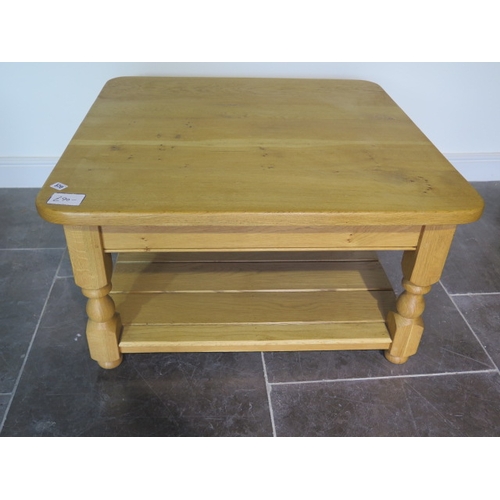 559 - A modern oak coffee table