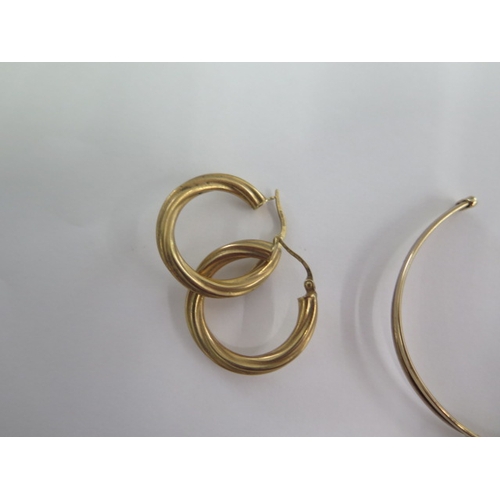 103 - A pair of 9ct yellow gold earrings - approx weight 2.9 grams - an 18ct yellow gold ring size K - app... 