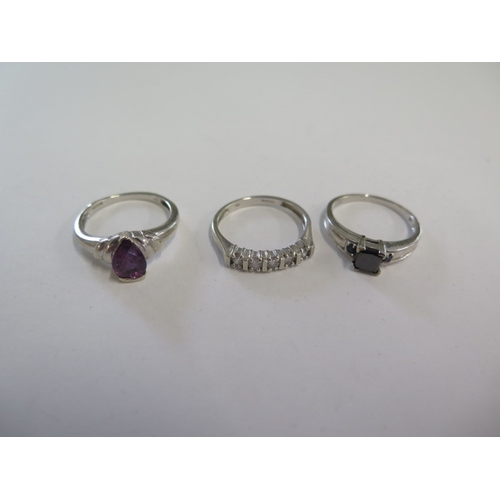 108 - A 9ct white gold black diamond ring size N/O and two other 9ct white gold rings - total weight appro... 