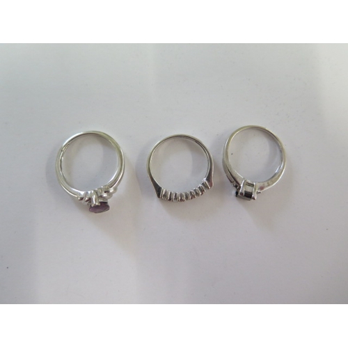 108 - A 9ct white gold black diamond ring size N/O and two other 9ct white gold rings - total weight appro... 