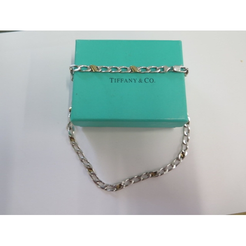 113 - A Tiffany & Co 925 silver and 750 18ct gold 41cm necklace made in Italy with a box