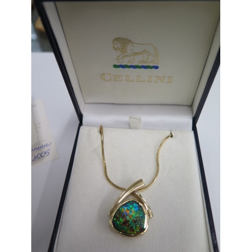 117 - A 14ct Ammolite pendant on 14ct 44cm chain - total weight approx 16.9 grams - in good condition