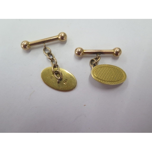 131 - A pair of 9ct yellow gold cufflinks - approx weight 7.2 grams