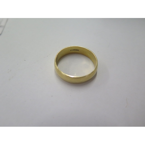 133 - An 18ct yellow gold band ring size Z3 - approx weight 8.4 grams