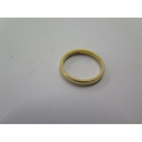 134 - An 18ct yellow gold band ring size L - approx weight 3.4 grams