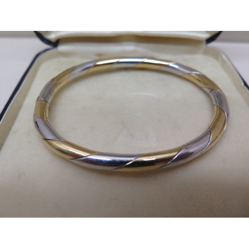 149 - A 9ct white and yellow gold bracelet stamped on clasp 375 - approx weight 18.4 grams - in good condi... 