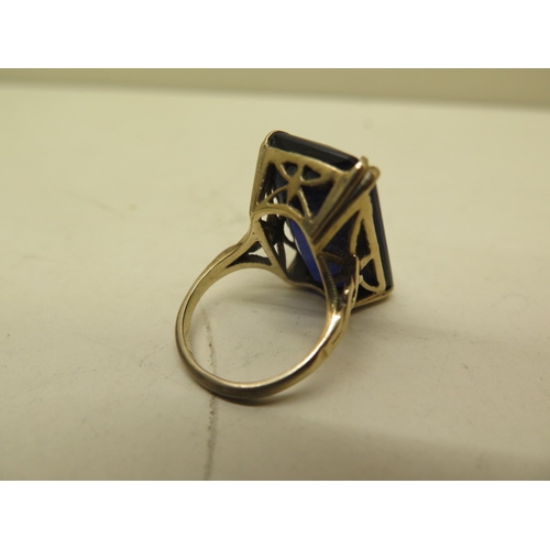 150 - A 9ct gold ladies ring size O with a large blue stone and good quality shank - approx weight 12 gram... 