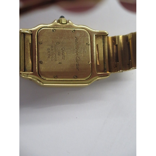 40 - A Cartier 18ct yellow gold gents Santos date quartz bracelet wristwatch no 887901 0878 - 29mm case -... 