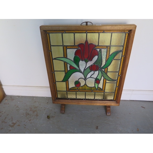 545 - A stained glass fire screen - Height 73cm x 61cm - in good condition