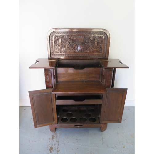 549 - A carved Chinese drinks cabinet with a fitted interior - Height 98cm x 84cm x 40cm