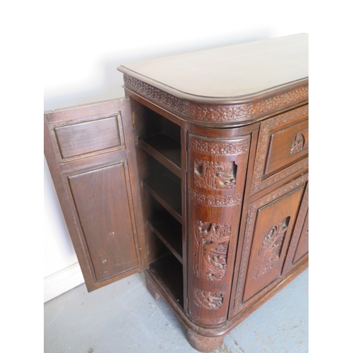 549 - A carved Chinese drinks cabinet with a fitted interior - Height 98cm x 84cm x 40cm