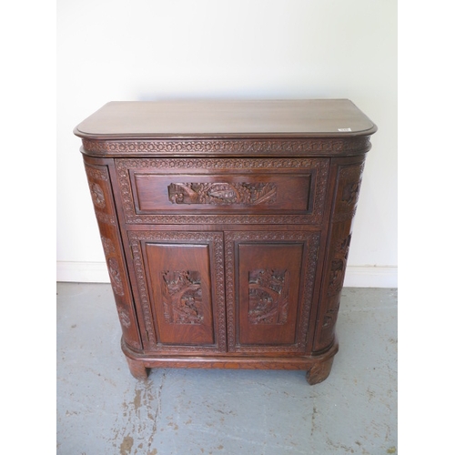 549 - A carved Chinese drinks cabinet with a fitted interior - Height 98cm x 84cm x 40cm