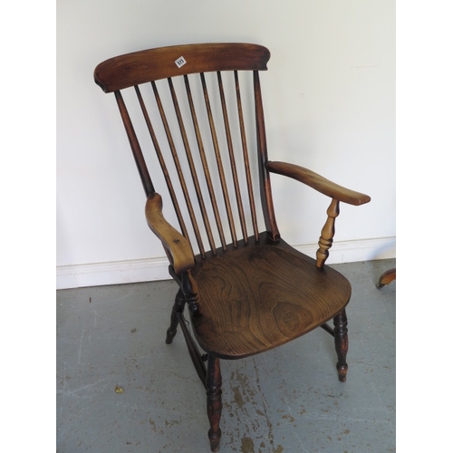 573 - A 19th century ash and elm Windsor chair