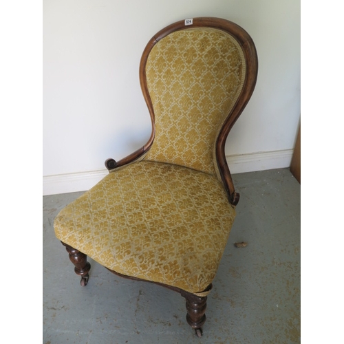 574 - A 19th century mahogany nursing chair for restoration