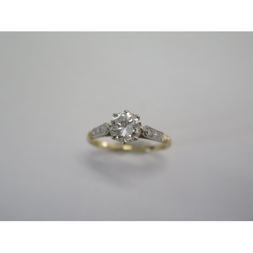 61 - A yellow gold diamond solitaire ring - The central 1.15ct brilliant cut diamond approx 6.8mm x 3.9mm... 