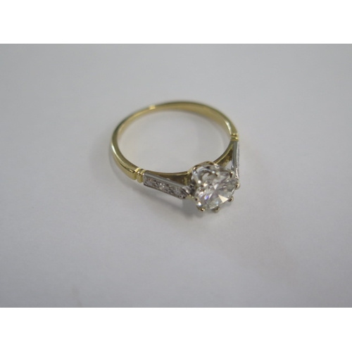 61 - A yellow gold diamond solitaire ring - The central 1.15ct brilliant cut diamond approx 6.8mm x 3.9mm... 