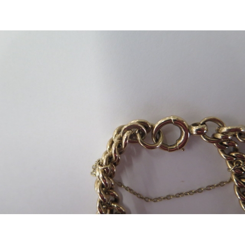 62 - A 9ct yellow gold watch chain converted into a bracelet - total weight approx 53 grams - clasp good,... 