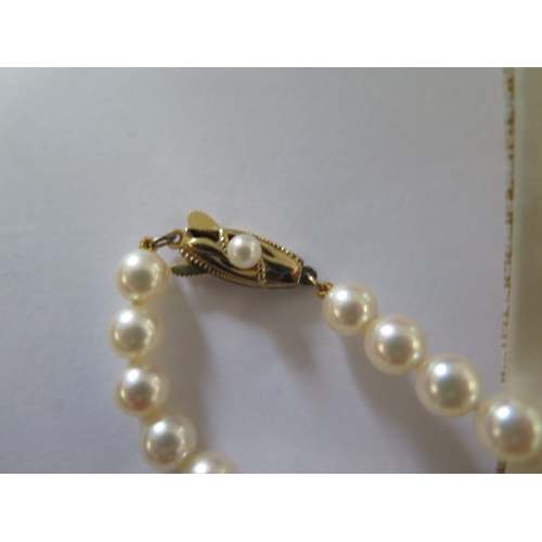 83 - A string of Mikimoto pearls with a 14ct gold clasp - Length 109cm - pearls approx 6mm diameter - goo... 