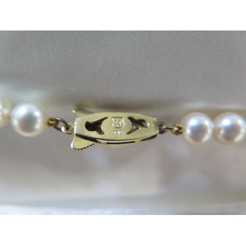 83 - A string of Mikimoto pearls with a 14ct gold clasp - Length 109cm - pearls approx 6mm diameter - goo... 