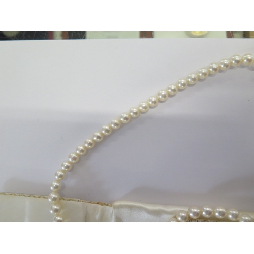 83 - A string of Mikimoto pearls with a 14ct gold clasp - Length 109cm - pearls approx 6mm diameter - goo... 