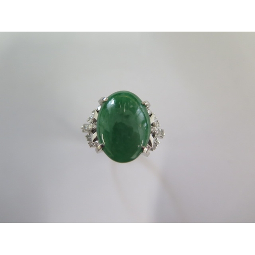 85 - A 900 platinum green Jade and diamond ring size L/M - approx weight 10 grams - Jade approx 18mm x 13... 