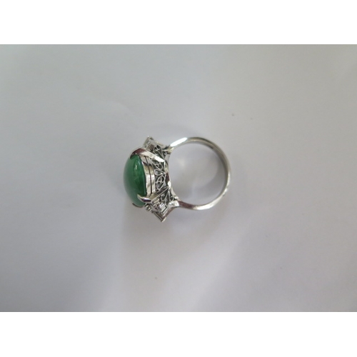 85 - A 900 platinum green Jade and diamond ring size L/M - approx weight 10 grams - Jade approx 18mm x 13... 