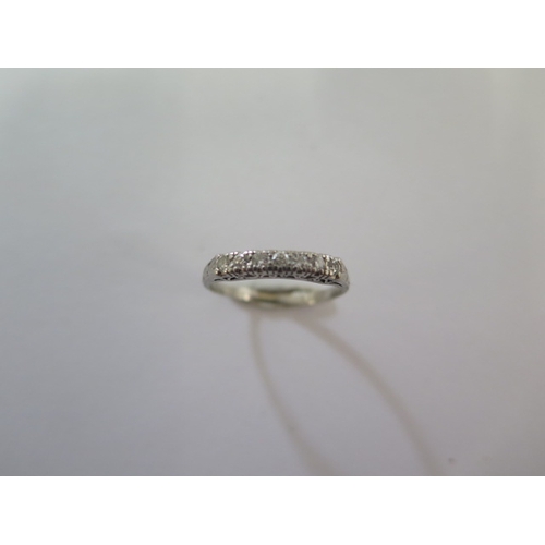 90 - A white metal seven stone diamond ring size K/L - approx weight 2.6 grams