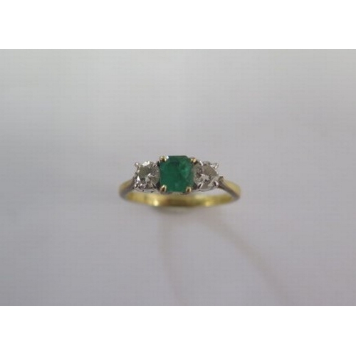 91 - A hallmarked 18ct yellow gold diamond and emerald three stone ring size M/N - approx weight 2.8 gram... 