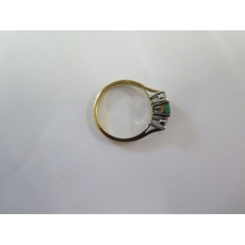 91 - A hallmarked 18ct yellow gold diamond and emerald three stone ring size M/N - approx weight 2.8 gram... 