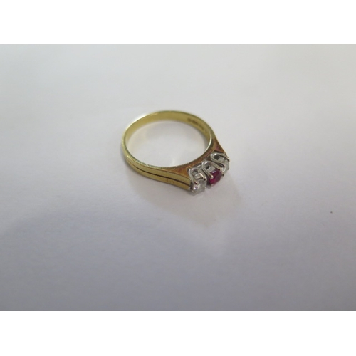 92 - A hallmarked 18ct yellow gold diamond and ruby three stone ring size N - approx weight 3.4 grams - i... 