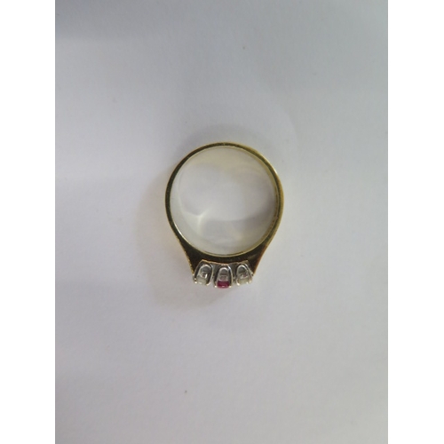 92 - A hallmarked 18ct yellow gold diamond and ruby three stone ring size N - approx weight 3.4 grams - i... 