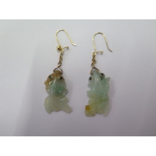 97 - A pair of Jade fish earrings on gilt metal hooks (missing a ball) 5.5cm