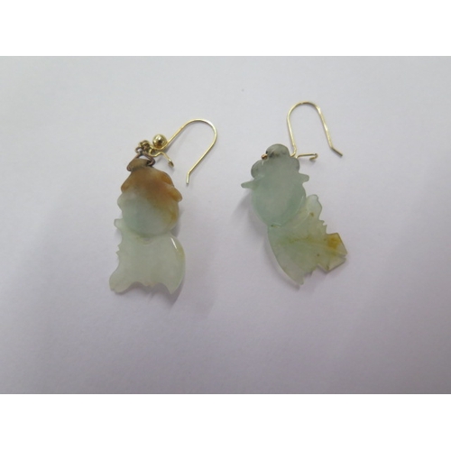 97 - A pair of Jade fish earrings on gilt metal hooks (missing a ball) 5.5cm