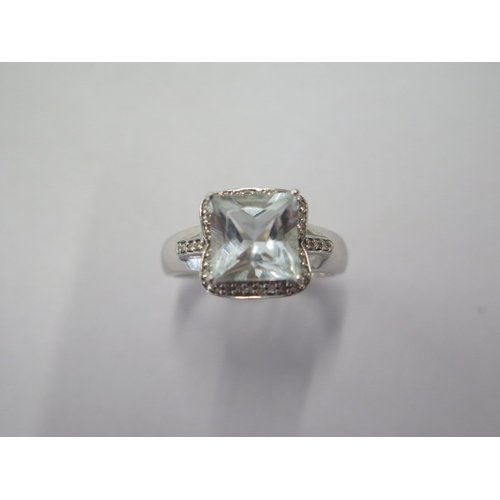 99 - A 9ct white gold aquamarine and diamond ring size R - approx weight 4.4 grams - in good condition