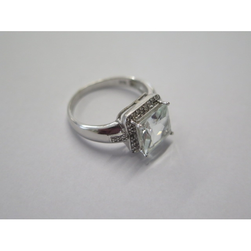 99 - A 9ct white gold aquamarine and diamond ring size R - approx weight 4.4 grams - in good condition