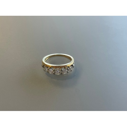 100 - A five stone diamond bridge ring set in 18ct yellow gold - approx total diamond weight 1.1ct - ring ... 