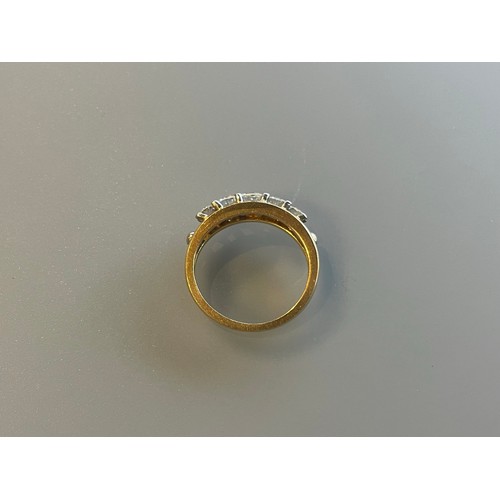 100 - A five stone diamond bridge ring set in 18ct yellow gold - approx total diamond weight 1.1ct - ring ... 