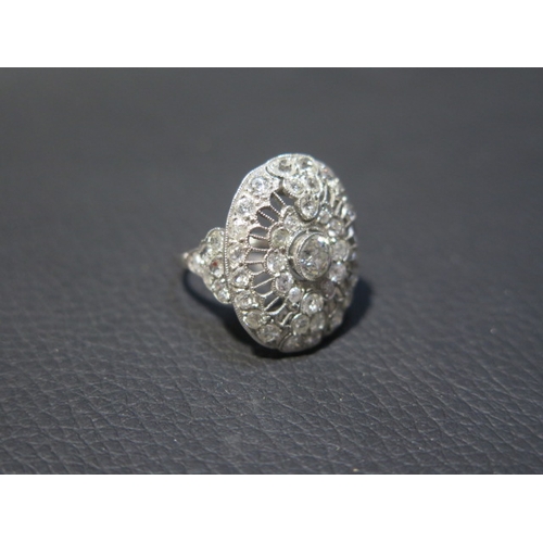 103 - A large 18ct white gold (tested) Art Deco style diamond ring, approx 2.5ct of diamonds - head size a... 