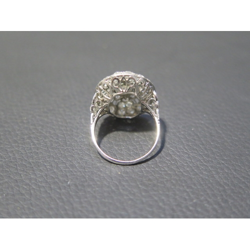 103 - A large 18ct white gold (tested) Art Deco style diamond ring, approx 2.5ct of diamonds - head size a... 