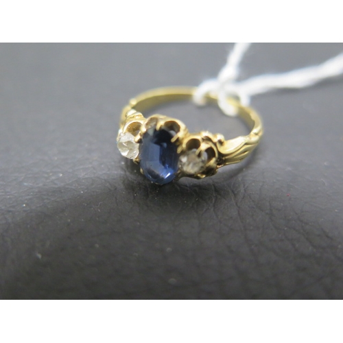 115 - An 18ct yellow gold three stone ring with sapphire and diamonds - ring size K - weight approx 2.7 gr... 